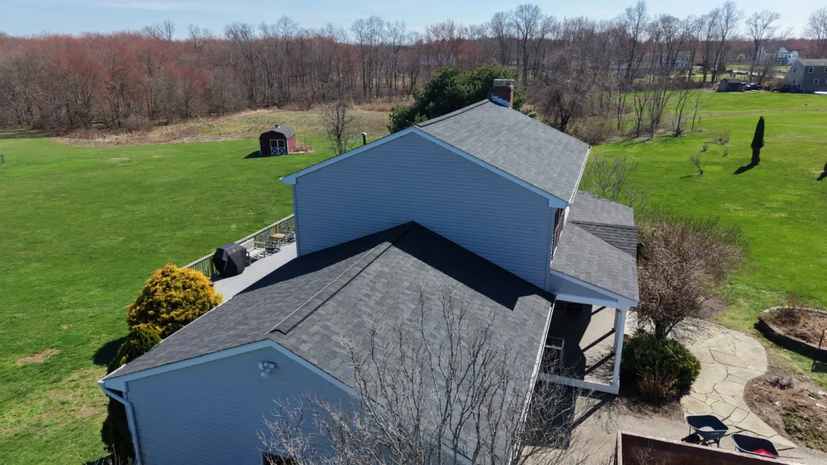 Residential roof with blue siding